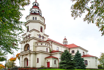 General view and architectural details of the Baroque Catholic Church of Our Lady of Częstochowa built in 1931 in the town of Mońki in Podlasie, Poland.