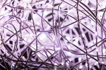 Fototapeta premium White and purple led lights to celebrate Christmas and other celebrations. Christmas and celebrations and festivities concept.