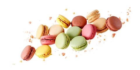 Selbstklebende Fototapeten Macarons French  sweet colorful  mixed cookies macarons macaroons with crumbs flying isolated  © BarTa