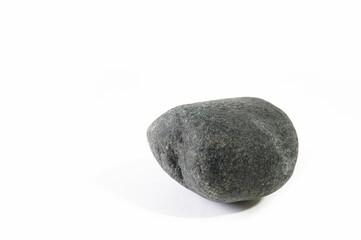 Dark gray stone on a white background.