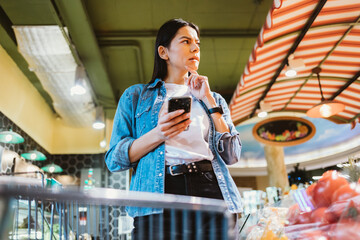Brunette woman with mobile phone