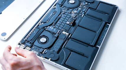 Computer diagnostics. Maintenance repair engineer support. Pc technician service with laptop on hardware background. Electronic technology development concept.