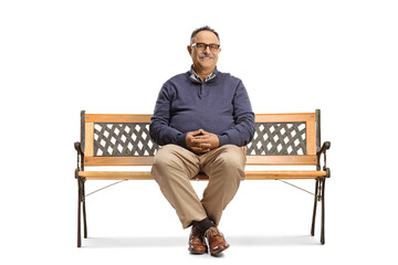 Smiling mature man with glasses sitting on a bench