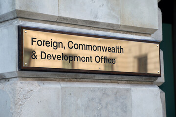 London, UK, 5 November 2021: Sign by the main entrance to the UK Foreign, Commonwealth and...