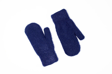 Blue woolen mittens isolated on white background. Winter clothes. Flat lay, top view.