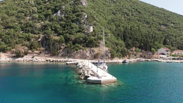 Drone view of Frikes port and turquoise sea in Ithaca Greece