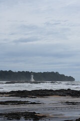 waves crashing on rocks