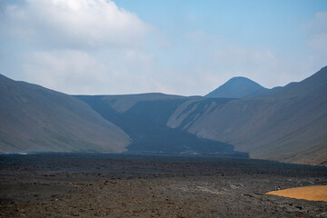 Landscape of vast molten lava rock covering valley at Fagradalsfjall Volcano eruption Iceland