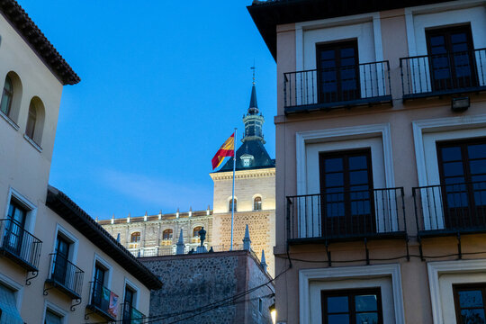 Looking up to the Alcazar de Toledo At night With Local Residences in the picture