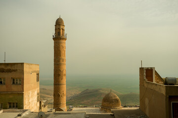 Ancient minaret in the city of Mardin overlooking the Mesopotamian grasslands