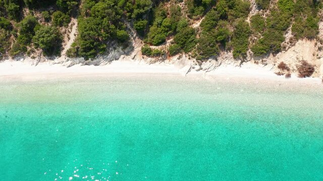 Drone view of beach hut at Gidaki beach and turquoise sea in Ithaca island, Greece