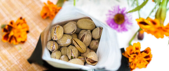 Salted pistachios in an open package