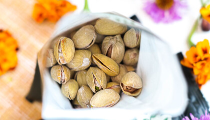 Salted pistachios in an open package