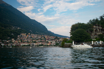 Fototapeta na wymiar Private boat tour around Lake Como Italy at sunset