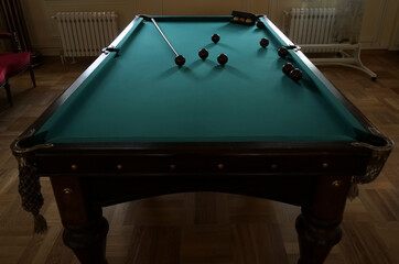  billiard balls on a table with green mat. The balls are placed to start the game. - obrazy, fototapety, plakaty