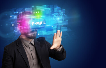 Businessman looking through Virtual Reality glasses