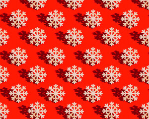 Christmas pattern with wooden snowflake on red Decoration for winter celebration New Year holiday concept.