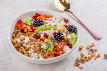 Cottage cheese with granola, berries