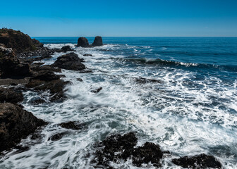 Fototapeta na wymiar Panoramic view of the coast of punta de lobos on a sunny day.