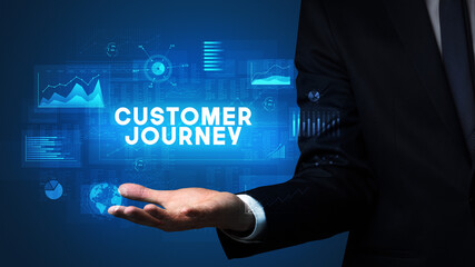 Hand of Businessman holding motivational message