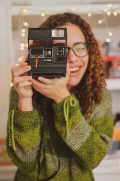 girl with polaroid camera