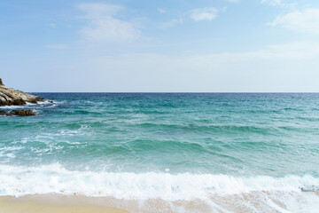 Sea waves and sandy beach. Relaxing concept photography background. High quality photo