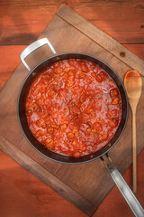 Homemade pasta sauce with sausage in the pan