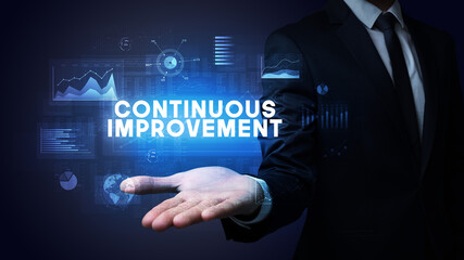 Hand of Businessman holding motivational message
