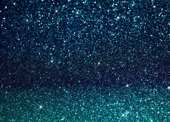 Shiny christmas background from light to dark, blue glitter texture christmas background