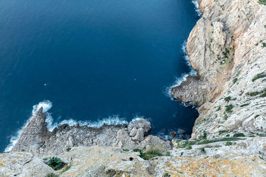 Vertical seascape down the cliff at Mirador es Colomer, Mallorca
