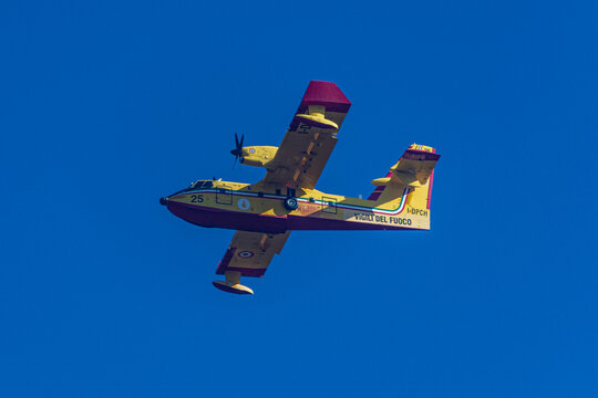 An Italien Canadair Plane flying over a Forest Fire in Kirschwang, Lower Austria
