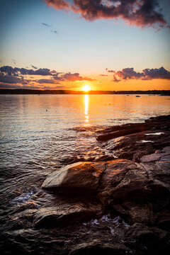 Sunset over rocky shoreline in southern coastal Maine near Boothbay Harbor