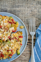 Homemade mixed veggie and cheese omelet on the table for breakfast