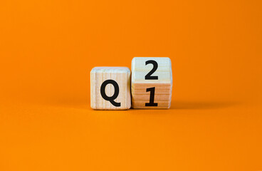 From 1st to 2nd quarter symbol. Turned a wooden cube and changed words 'Q1' to 'Q2'. Beautiful...