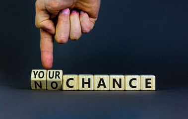 Your or my chance symbol. Businessman turns wooden cubes and changes words 'my chance' to 'your chance'. Beautiful grey background, copy space. Business and your or my chance concept.