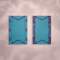 Business card in turquoise with Greek purple ornaments for your brand.