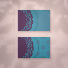 Business card template in turquoise color with a purple mandala ornament for your personality.