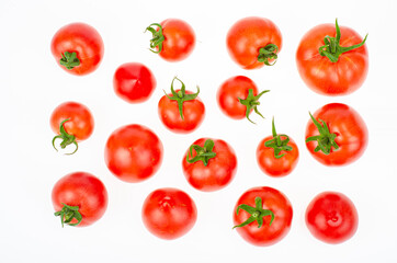 Bunch of ripe fresh pink farm tomatoes with isolated on white background. Studio Photo.