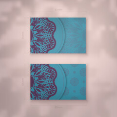 Business card template in turquoise color with greek purple ornaments for your personality.