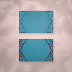 Business card template in turquoise color with greek purple pattern for your business.