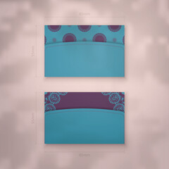 Business card template in turquoise color with vintage purple ornaments for your contacts.