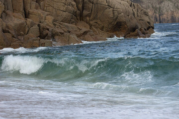 waves crashing on rocks