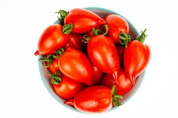 Red ripe oval tomatoes. Studio Photo.