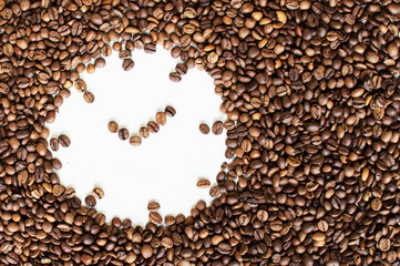 clock made from coffee beans on a white background. Coffee time. kind of sveru. flat lay. space for inspirational text.
