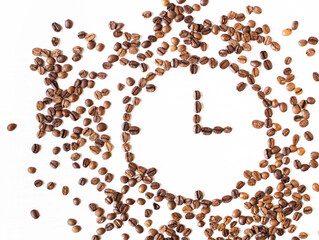 clock made from coffee beans on a white background. Coffee time. kind of sveru. flat lay. space for...