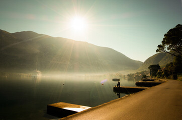 Fisherman fishing in the morning in the Kotor Bay in Montenegro 