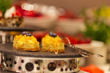 confectionery cakes and desserts on the table. Sweet bakes