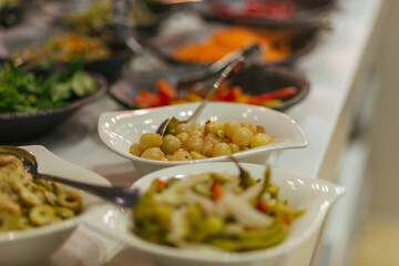 assorted olives and olives on the table