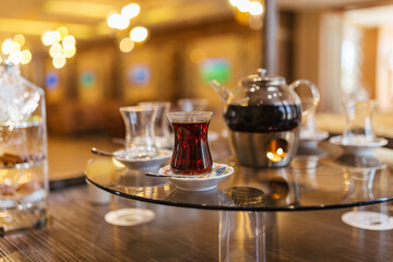 Glass Cup of turkish tea served in traditional style 