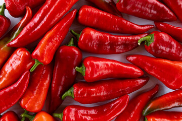 background of fresh red pepper, raw vegetables